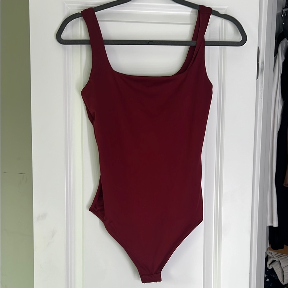 Burgundy body suit